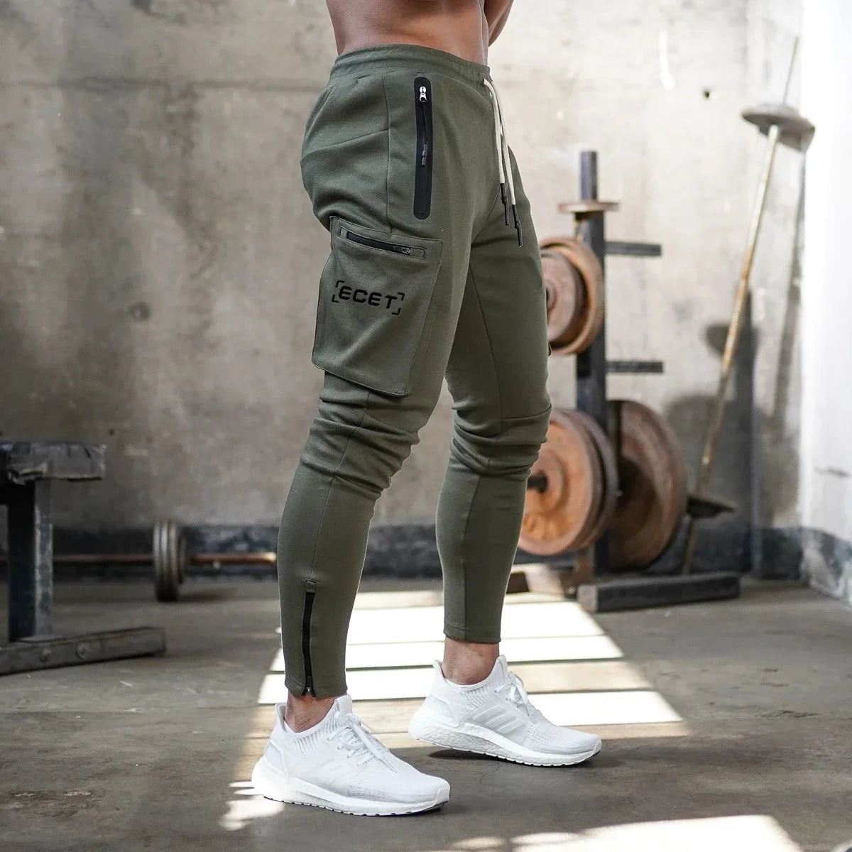 Pantalon de jogging sportif coupe ajustée homme | Avec poches zippées