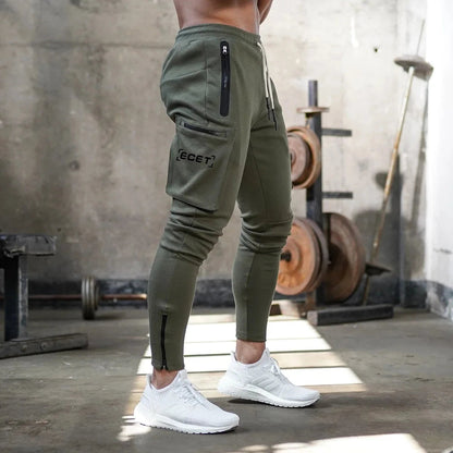 Pantalon de jogging sportif coupe ajustée homme | Avec poches zippées