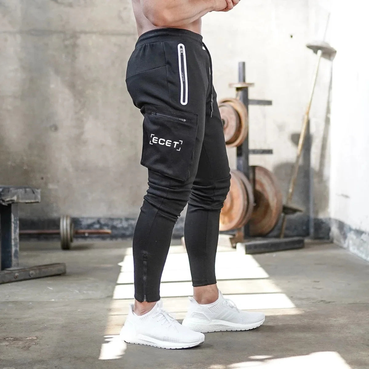 Pantalon de jogging sportif coupe ajustée homme | Avec poches zippées