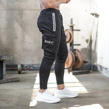 Pantalon de jogging sportif coupe ajustée homme | Avec poches zippées